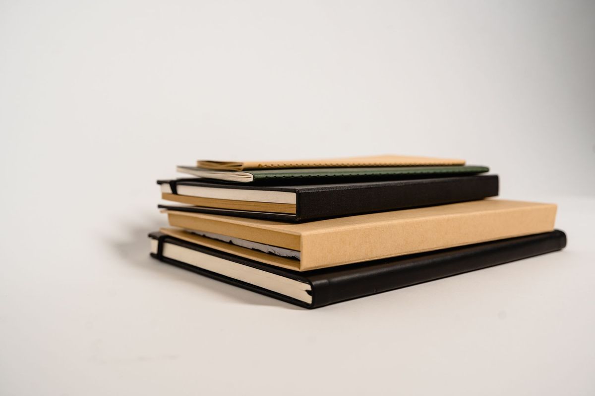 Pile de carnets de tailles différentes